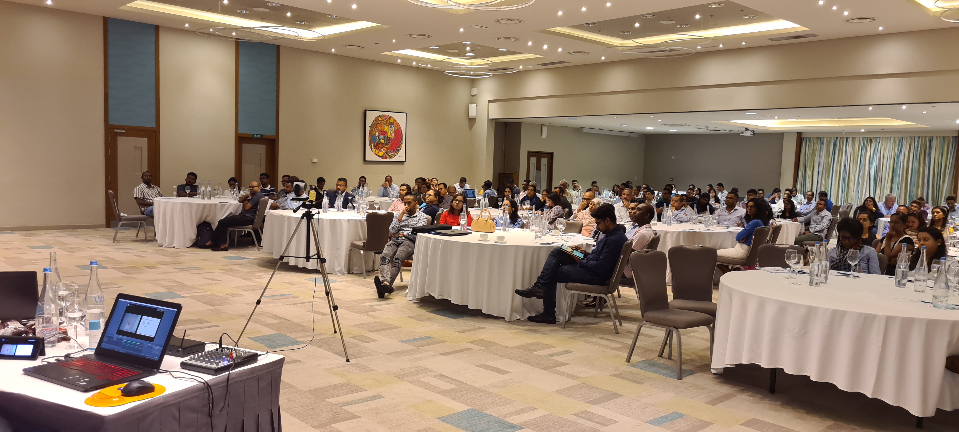 Finance professionals in a boardroom workshop